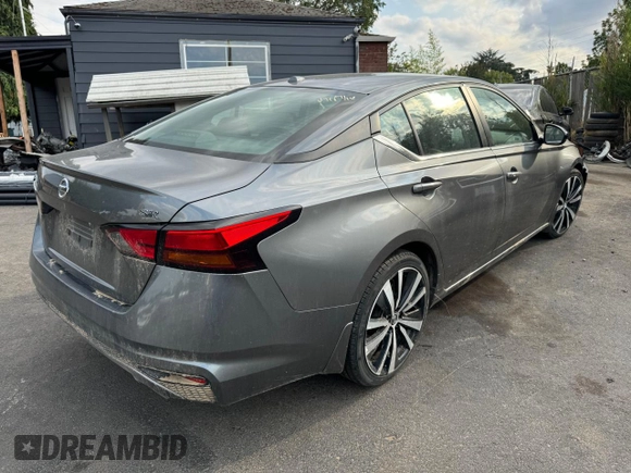 2022 Nissan Altima SR with VIN 1N4BL4CV6NN365572, listed as a Copart auction lot 82061064 with 56,656 mi miles and Salvage Title. Bid and sale history available at DreamBid. Image 4.