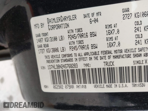 2004 Dodge Dakota Sport with VIN 1D7HL38N24S768283, listed as a IAAI auction lot 41635910 with 328,505 mi miles. Bid and sale history available at carsss.com. Image 9.