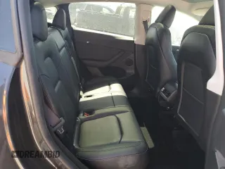 2024 Tesla Model Y z VIN 7SAYGDED7RF050963, wystawiony jako Copart lot #60683895 z przebiegiem 23 100 mil mil oraz Czysty tytuł • Clean title. Historia ofert i sprzedaży dostępna na DreamBid. Obrazek 10.