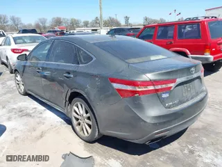 2013 Toyota Avalon XLE with VIN 4T1BK1EB3DU002645, listed as a IAAI auction lot 41764668 with 203,753 mi miles. Bid and sale history available at carsss.com. Image 3.
