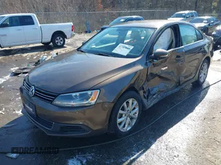 2014 Volkswagen Jetta Sedan SE w/Connectivity with VIN 3VWD07AJ1EM361255, listed as a IAAI auction lot 41385849 with 166,124 mi miles. Bid and sale history available at carsss.com. Image 17.