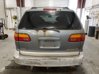 1999 Toyota Sienna LE with VIN 4T3ZF13C2XU123953, listed as a Copart auction lot 52193705 with 174,886 mi miles and Clean Title. Bid and sale history available at carsss.com. Image 6.
