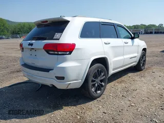 2018 Jeep Grand Cherokee Altitude with VIN 1C4RJFAG9JC162874, listed as a IAAI auction lot 42396844 with 102,321 mi miles and . Bid and sale history available at DreamBid. Image 4.