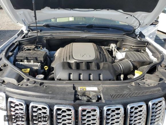 2019 Jeep Grand Cherokee Overland with VIN 1C4RJFCT2KC834690, listed as a Copart auction lot 84303144 with 63,053 mi miles and Salvage Title. Bid and sale history available at carsss.com. Image 12.
