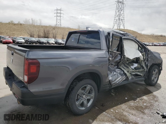 2023 Honda Ridgeline RTL-E with VIN 5FPYK3F78PB010961, listed as a Copart auction lot 51458635 with 33,508 mi miles and Salvage title. Bid and sale history available at DreamBid. Image 3.