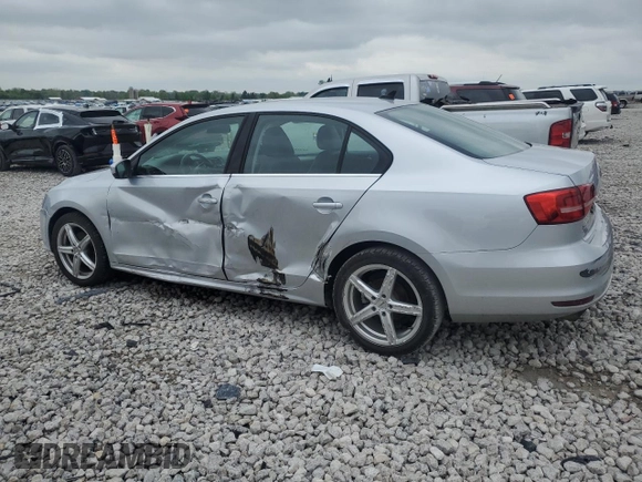 2015 Volkswagen Jetta SE z VIN 3VWD07AJ0FM252092, wystawiony jako Copart lot #56682945 z przebiegiem 104 325 mil mil oraz Czysty tytuł • Clean title. Historia ofert i sprzedaży dostępna na DreamBid. Obrazek 2.