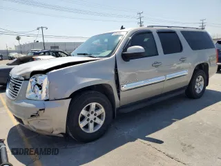 2007 GMC Yukon XL SLE z VIN 1GKFC16J37J193938, wystawiony jako Copart lot #60539545 z przebiegiem 127 639 mil mil oraz Szkoda całkowita • Salvage title. Historia ofert i sprzedaży dostępna na DreamBid. Obrazek 1.