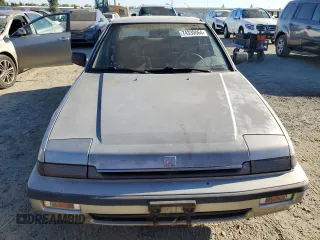 1988 Honda Accord with VIN JHMCA5539JC062134, listed as a Copart auction lot 74330064 with 168,176 mi miles and Salvage title. Bid and sale history available at DreamBid. Image 5.