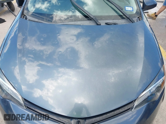 2018 Toyota Corolla L with VIN 5YFBURHE1JP832911, listed as a IAAI auction lot 42237901 with 92,158 mi miles and . Bid and sale history available at DreamBid. Image 6.