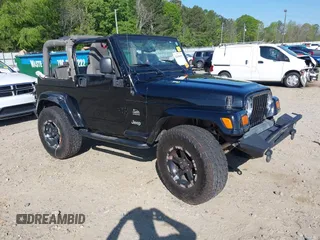 2004 Jeep Wrangler Sahara z VIN 1J4FA59S74P801296, wystawiony jako IAAI lot #42049291 z przebiegiem 152 208 mil mil oraz . Historia ofert i sprzedaży dostępna na DreamBid. Obrazek 1.