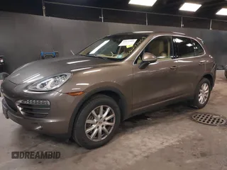 2014 Porsche Cayenne with VIN WP1AA2A26ELA93026, listed as a IAAI auction lot 42272409 with 58,951 mi miles and . Bid and sale history available at DreamBid. Image 2.