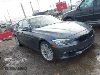 2014 BMW 3 Series 335i xDrive with VIN WBA3B9C53EF588061, listed as a IAAI auction lot 41652035 with 123,345 mi miles and . Bid and sale history available at carsss.com. Image 1.