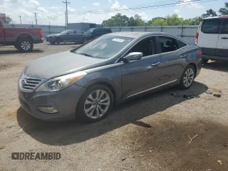 2013 Hyundai Azera z VIN KMHFG4JG6DA267440, wystawiony jako Copart lot #55938985 z przebiegiem 76 692 mil mil oraz Szkoda całkowita • Salvage title. Historia ofert i sprzedaży dostępna na DreamBid. Obrazek 1.