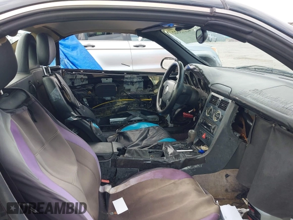 1999 Mercedes-Benz SLK 230/320 with VIN WDBKK47F0XF086064, listed as a IAAI auction lot 42223522 with 166,381 mi miles and . Bid and sale history available at DreamBid. Image 5.