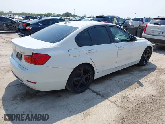 2012 BMW 3 Series 328i with VIN WBA3A5C56CF341495, listed as a IAAI auction lot 42267769 with 224,561 mi miles and . Bid and sale history available at DreamBid. Image 4.