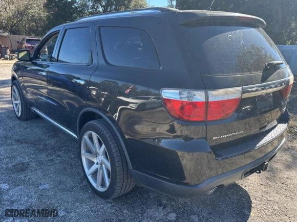 2013 Dodge Durango Crew with VIN 1C4SDHDT1DC697618, listed as a Copart auction lot 88926165 with 128,218 mi miles and Clean Title. Bid and sale history available at carsss.com. Image 3.