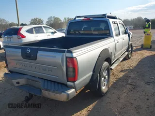 2003 Nissan Frontier SE z VIN 1N6ED29X23C450948, wystawiony jako IAAI lot #41902685 z przebiegiem 209 330 mil mil oraz . Historia ofert i sprzedaży dostępna na DreamBid. Obrazek 4.