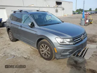 2019 Volkswagen Tiguan SE with VIN 3VV3B7AX4KM066161, listed as a Copart auction lot 59897705 with 86,556 mi miles and Salvage title. Bid and sale history available at DreamBid. Image 4.