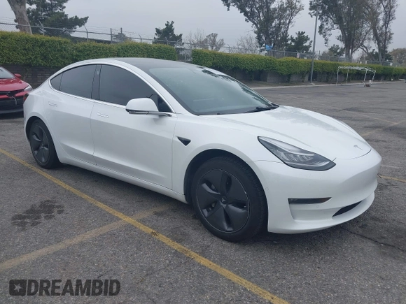 2020 Tesla Model 3 Long Range with VIN 5YJ3E1EB0LF803217, listed as a IAAI auction lot 41871940 with 130,391 mi miles. Bid and sale history available at carsss.com. Image 1.