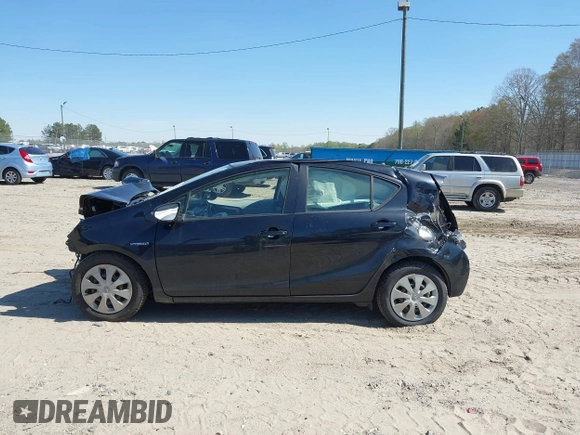 2013 Toyota Prius One z VIN JTDKDTB33D1529206, wystawiony jako IAAI lot #41874722 z przebiegiem 99 417 mil mil oraz . Historia ofert i sprzedaży dostępna na DreamBid. Obrazek 13.