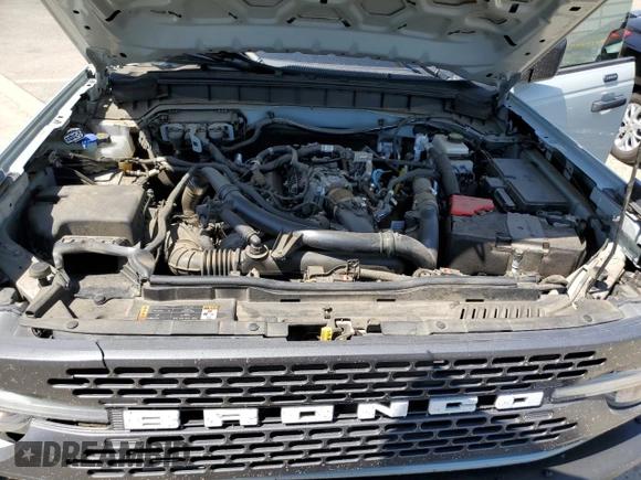 2021 Ford Bronco z VIN 1FMEE5DP1MLB07165, wystawiony jako Copart lot #59050885 z przebiegiem 49 044 mil mil oraz Szkoda całkowita • Salvage title. Historia ofert i sprzedaży dostępna na DreamBid. Obrazek 11.