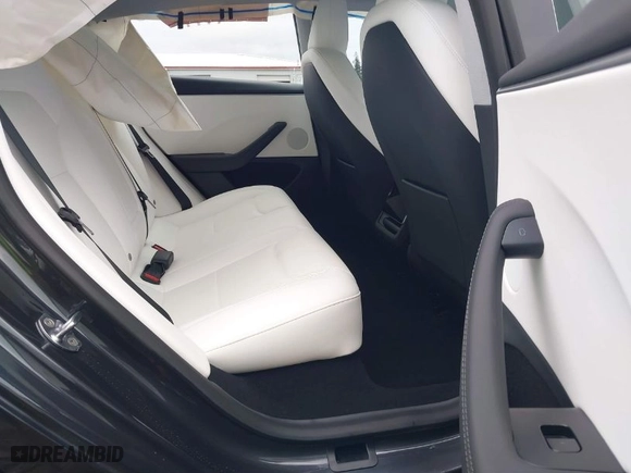 2025 Tesla Model 3 Long Range with VIN 5YJ3E1EB2SF921588, listed as a IAAI auction lot 41609999 with 113 mi miles. Bid and sale history available at carsss.com. Image 8.