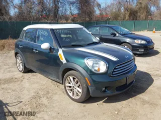 2013 MINI Cooper Countryman with VIN WMWZB3C57DWR35414, listed as a IAAI auction lot 41771890 with 141,561 mi miles. Bid and sale history available at carsss.com. Image 1.