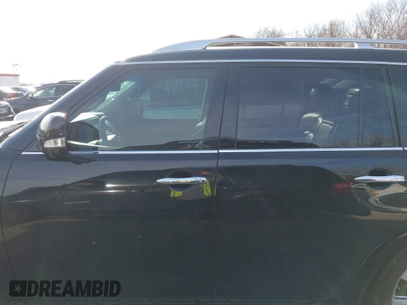 2012 Infiniti QX56 8-passenger with VIN JN8AZ2ND1C9715889, listed as a IAAI auction lot 41440893 with 221,212 mi miles and . Bid and sale history available at DreamBid. Image 15.