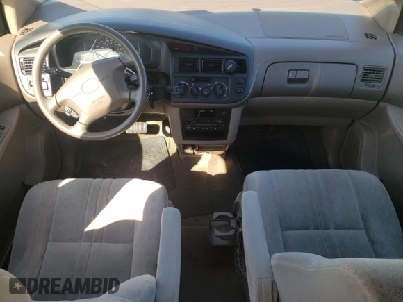 1999 Toyota Sienna CE with VIN 4T3ZF19C6XU098787, listed as a Copart auction lot 47465735 with 176,082 mi miles and Salvage Title. Bid and sale history available at carsss.com. Image 8.