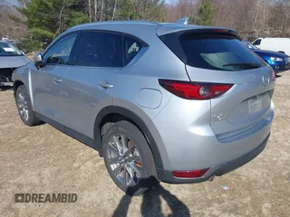 2021 Mazda CX-5 Grand Touring Reserve with VIN JM3KFBAY5M0472988, listed as a IAAI auction lot 41897855 with 27,318 mi miles. Bid and sale history available at carsss.com. Image 3.