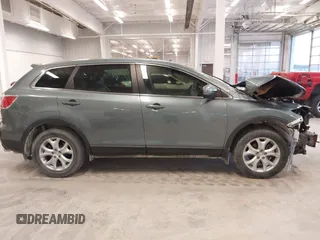 2011 Mazda CX-9 Touring with VIN JM3TB2CA2B0332314, listed as a IAAI auction lot 41077372 with 138,537 mi miles and . Bid and sale history available at DreamBid. Image 14.