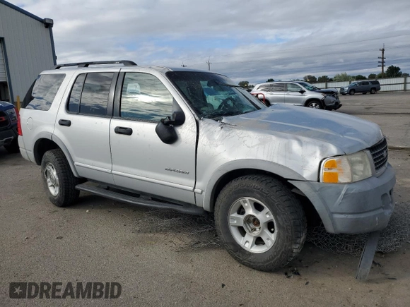 2002 Ford Explorer XLS with VIN 1FMZU72E02UA28983, listed as a Copart auction lot 56871915 with Not provided miles and Salvage title. Bid and sale history available at DreamBid. Image 4.