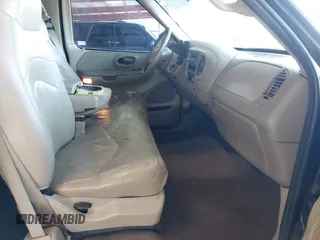 2001 Ford F-150 XL z VIN 1FTRX17L31KF27691, wystawiony jako IAAI lot #42749733 z przebiegiem 198 790 mil mil oraz . Historia ofert i sprzedaży dostępna na DreamBid. Obrazek 5.