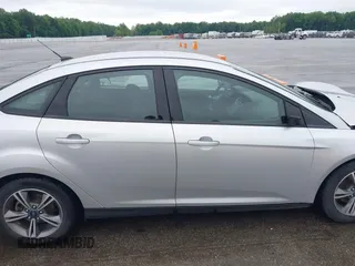 2017 Ford Focus SE with VIN 1FADP3FEXHL283329, listed as a IAAI auction lot 42347751 with 85,337 mi miles and . Bid and sale history available at DreamBid. Image 14.