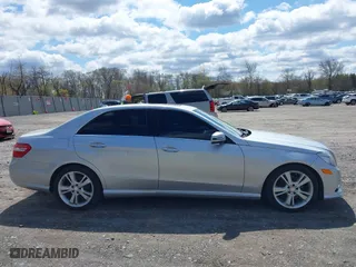 2013 Mercedes-Benz E-Class E 350 Luxury with VIN WDDHF8JB8DA740708, listed as a IAAI auction lot 42050622 with 243,585 mi miles. Bid and sale history available at carsss.com. Image 13.