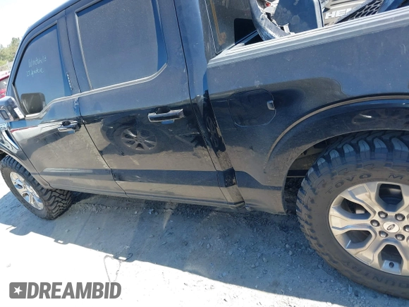 2021 Ford F-150 XL with VIN 1FTFW1E55MFC59394, listed as a IAAI auction lot 41675660 with 90,808 mi miles and . Bid and sale history available at DreamBid. Image 14.