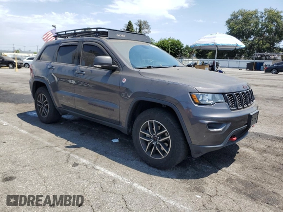2019 Jeep Grand Cherokee Trailhawk z VIN 1C4RJFLG6KC759527, wystawiony jako Copart lot #64862645 z przebiegiem 76 079 mil mil oraz Szkoda całkowita • Salvage title. Historia ofert i sprzedaży dostępna na DreamBid. Obrazek 4.