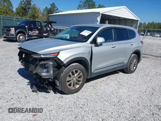 2019 Hyundai Santa Fe SE with VIN 5NMS2CAD4KH109117, listed as a IAAI auction lot 41591901 with 133,338 mi miles. Bid and sale history available at carsss.com. Image 2.