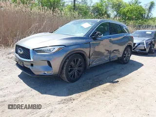 2020 Infiniti QX50 Luxe z VIN 3PCAJ5M39LF113955, wystawiony jako IAAI lot #42103238 z przebiegiem 94 886 mil mil oraz . Historia ofert i sprzedaży dostępna na DreamBid. Obrazek 19.