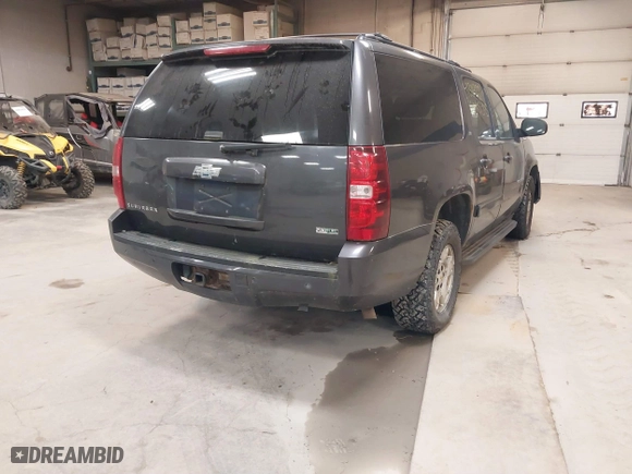 2010 Chevrolet Suburban LT with VIN 1GNUKJE36AR139025, listed as a IAAI auction lot 41311327 with 201,955 mi miles. Bid and sale history available at carsss.com. Image 4.