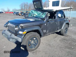 2019 Jeep Wrangler Unlimited Sport S with VIN 1C4HJXDG7KW572294, listed as a IAAI auction lot 41607986 with 61,734 mi miles and . Bid and sale history available at DreamBid. Image 17.