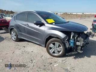 2019 Honda HR-V EX with VIN 3CZRU5H56KM730868, listed as a IAAI auction lot 41861035 with 63,825 mi miles. Bid and sale history available at carsss.com. Image 1.