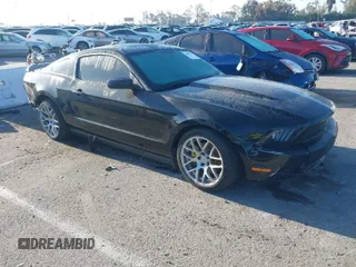 2012 Ford Mustang V6 Premium with VIN 1ZVBP8AM8C5245623, listed as a IAAI auction lot 42010878 with 104,247 mi miles. Bid and sale history available at carsss.com. Image 1.