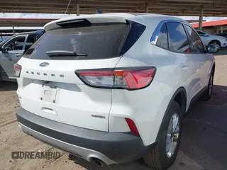 2022 Ford Escape SE with VIN 1FMCU9G64NUA60729, listed as a IAAI auction lot 41983647 with 210,119 mi miles and . Bid and sale history available at carsss.com. Image 4.