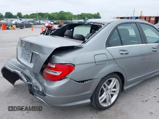 2014 Mercedes-Benz C 250 Sport with VIN WDDGF4HB6EG160494, listed as a IAAI auction lot 42310423 with 145,160 mi miles and . Bid and sale history available at DreamBid. Image 18.