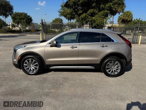 2023 Cadillac XT4 AWD Premium Luxury with VIN 1GYFZDR40PF108407, listed as a Copart auction lot 54799365 with 8,724 mi miles and Non Repairable. Bid and sale history available at carsss.com. Image 12.