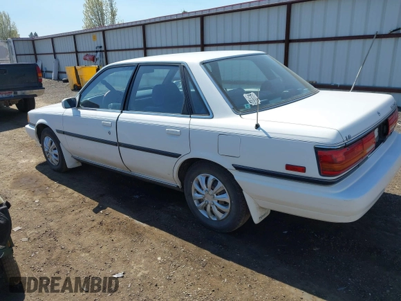 1990 Toyota Camry LE ECT z VIN JT2SV22E1L3427911, wystawiony jako IAAI lot #42040646 z przebiegiem 133 129 mil mil oraz . Historia ofert i sprzedaży dostępna na DreamBid. Obrazek 3.
