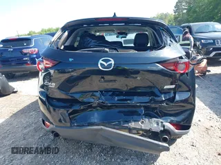 2017 Mazda CX-5 Touring z VIN JM3KFBCL0H0209458, wystawiony jako IAAI lot #42169599 z przebiegiem 93 287 mil mil oraz . Historia ofert i sprzedaży dostępna na DreamBid. Obrazek 16.
