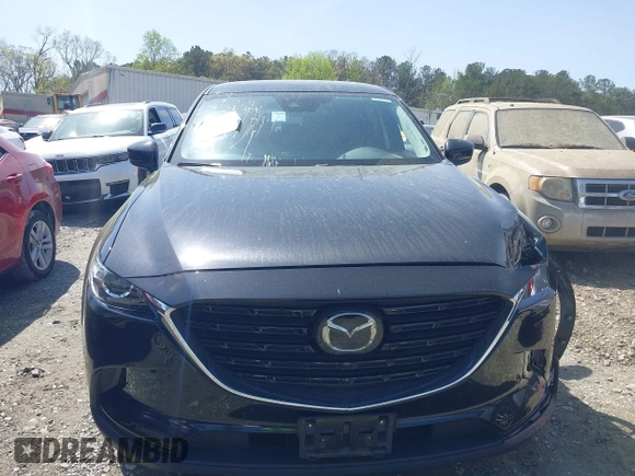 2023 Mazda CX-9 Touring Plus with VIN JM3TCBAY9P0657854, listed as a IAAI auction lot 41931409 with 54,036 mi miles and . Bid and sale history available at DreamBid. Image 12.