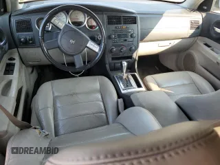2005 Dodge Magnum RT z VIN 2D4GV58255H677120, wystawiony jako Copart lot #65955544 z przebiegiem 157 671 mil mil oraz Szkoda całkowita • Salvage title. Historia ofert i sprzedaży dostępna na DreamBid. Obrazek 8.